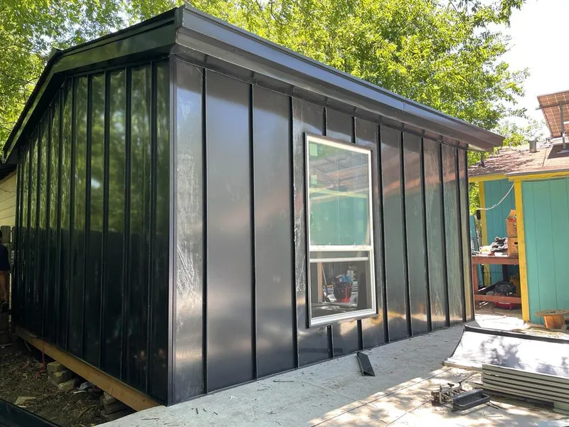 Black standing seam metal wall panels for Roof Inspection in Highland City