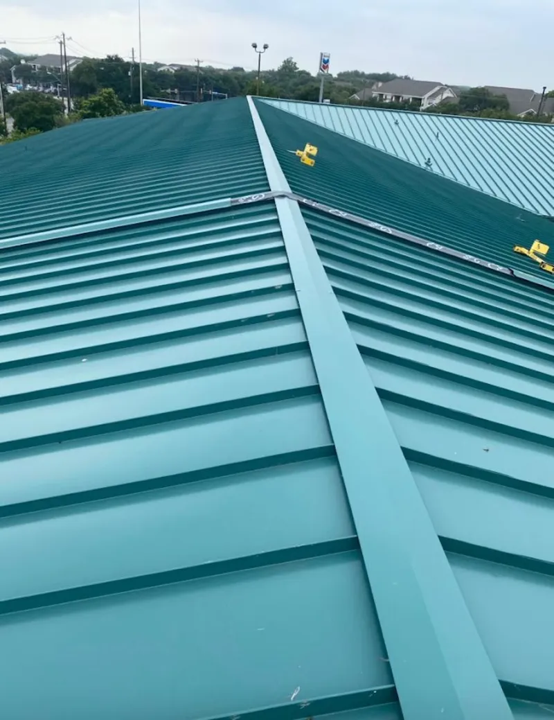 Green commercial metal roof ridge and valley for Metal Roof Repair in Highland City
