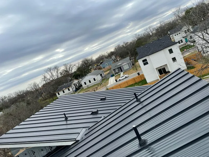 Standing seam metal roof panels with vents for Skylight Repair in Highland City